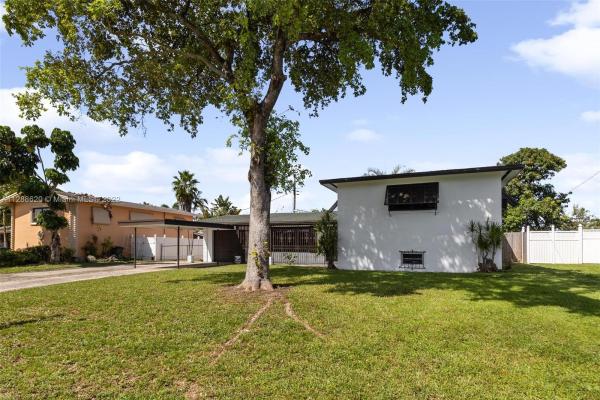 Mansionette Homes, 1215 NE 200th Ter, Ives Estates, Florida 33179, image 1