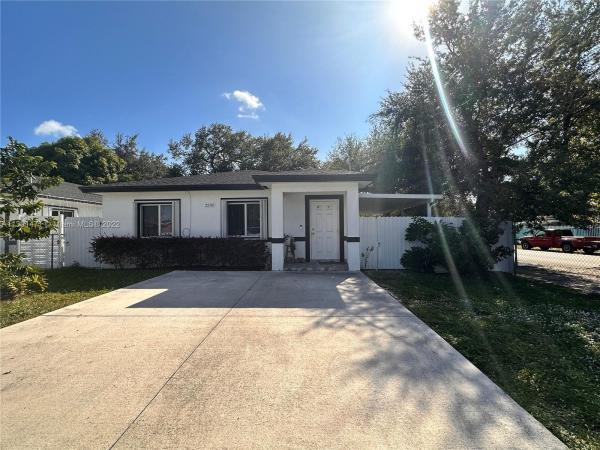 Seminole Lawn, 3288 NW 53rd St, Brownsville, Florida 33142, image 1