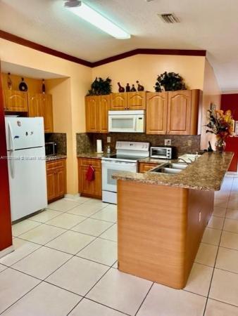 Adventure Homes, 14112 SW 145th Pl, Country Walk, Florida 33186, image 2