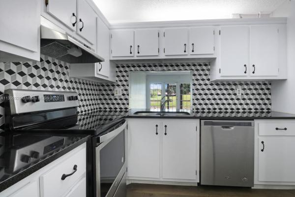 Cypress At Woodmont, 7410 Woodmont Ter #108, Tamarac, Florida 33321, image 1
