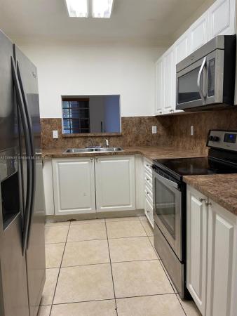 Bonita Golfview Townvillas, 7145 NW 173rd Dr #1108, Country Club, Florida 33015, image 1