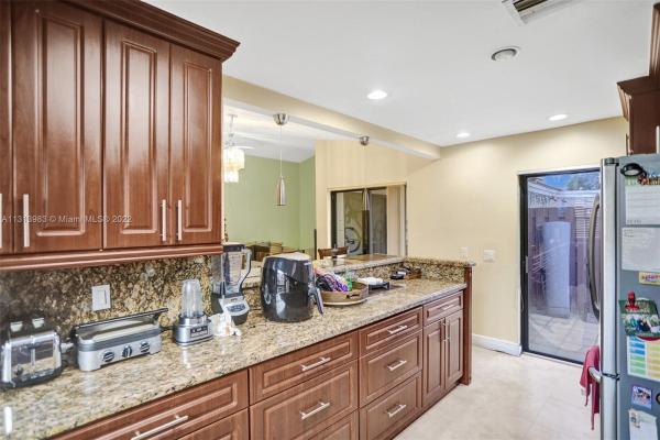 Villa Homes At The Moors, 6363 NW 170th Ln #6363, Country Club, Florida 33015, image 1