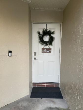 Villa Homes At The Moors, 6308 NW 170th Ter, Country Club, Florida 33015, image 1