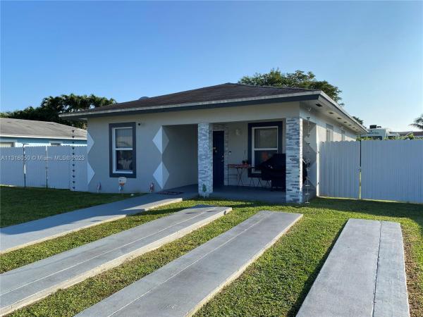 Caribbean Palms, 20421 SW 119th Ave, Three Lakes, Florida 33177, image 1