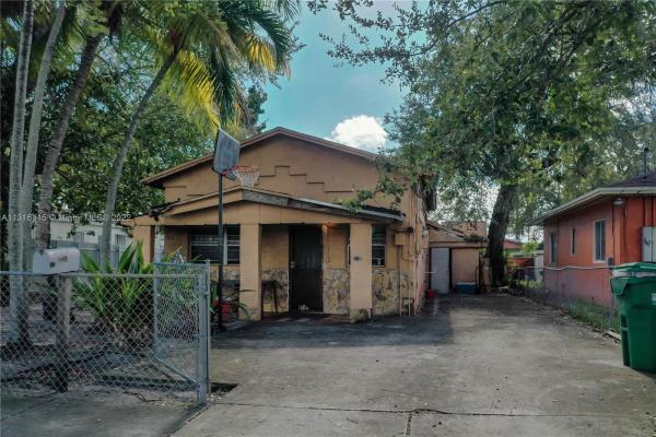 Seminole Lawn, 3384 NW 52nd St, Brownsville, Florida 33142, image 1
