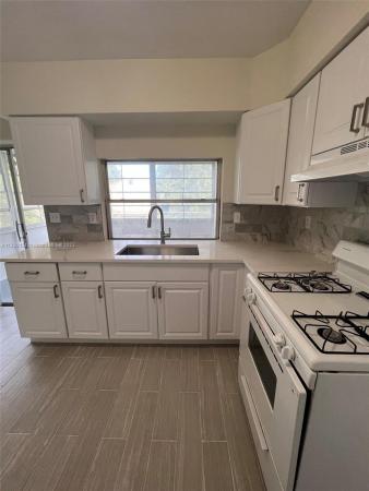 Sunrise Golf Village, 6441 NW 26th St, Sunrise, Florida 33313, image 1