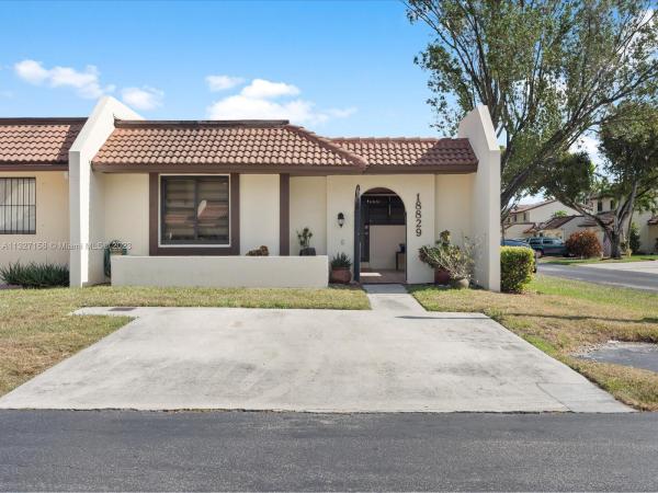 Townhomes Of Country Lake, 18829 NW 65th Ct #18829, Country Club, Florida 33015, image 1