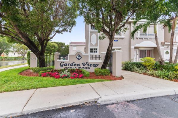 Garden View Villa Homes, 7211 NW 174th Ter #101, Country Club, Florida 33015, image 1