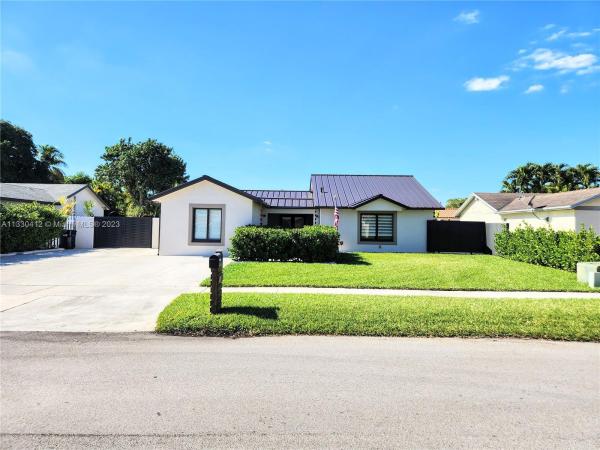 Country Lake Manors, 19730 NW 57th Pl, Country Club, Florida 33015, image 1