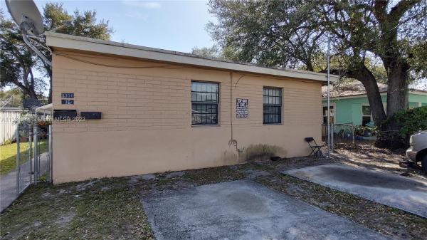 Seminole Lawn, 3358 NW 51st St, Brownsville, Florida 33142, image 1