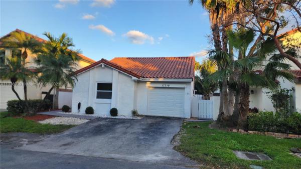 The Moors Cluster Homes, 17319 NW 63rd Ct, Country Club, Florida 33015, image 1