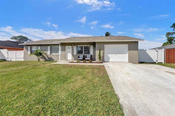 La Mancha, 145 Cortes Ave, Royal Palm Beach, Florida 33411, image 2