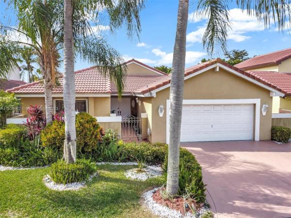 Patio Homes At The Moors, 17354 NW 62nd Ct, Country Club, Florida 33015, image 1