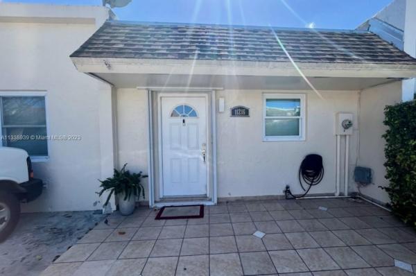 Karlan Townhouses, 11216 SW 33rd Cir Pl, University Park, Florida 33165, image 1