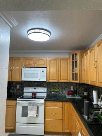 Coral Gate East, 6930 Miami Gardens Dr #1-406, Country Club, Florida 33015, image 2