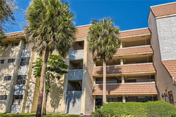 Summertree Village, 601 Ives Dairy Rd #102-8, Ives Estates, Florida 33179, image 1