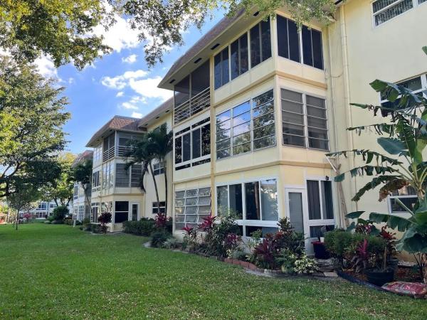 Lilac Gardens, 5131 W Oakland Park Blvd #111, Lauderdale Lakes, Florida 33313, image 1