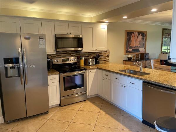 Jupiter Bay East, 275 Palm Ave #A103, Jupiter, Florida 33477, image 1