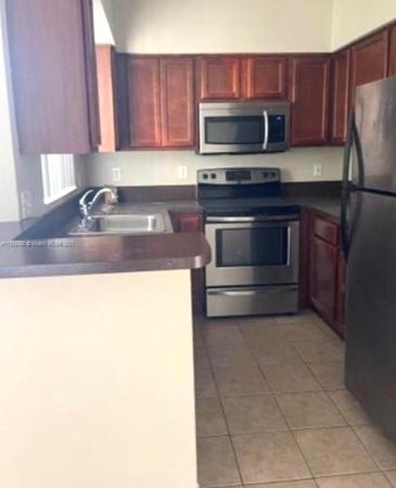 South Palm Place, 7680 Westwood Dr #830, Tamarac, Florida 33321, image 1