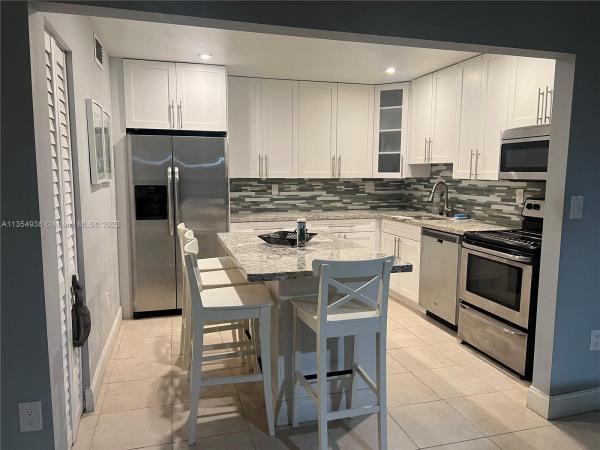 Northlake Village At The California Club, 770 NE 199th St #102F, Ives Estates, Florida 33179, image 1