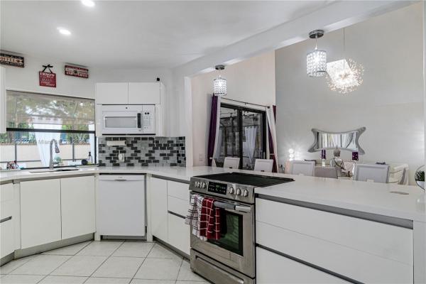 Patio Homes At The Moors, 17320 NW 62nd Pl, Country Club, Florida 33015, image 1