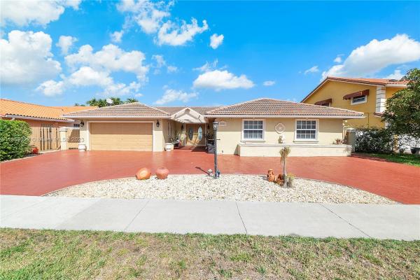 Country Lake Manors, 20031 NW 63rd Ct, Country Club, Florida 33015, image 1
