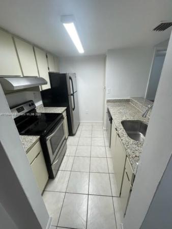 Las Brisas Country Club Of Miami, 6995 NW 186th St #E107, Country Club, Florida 33015, image 1