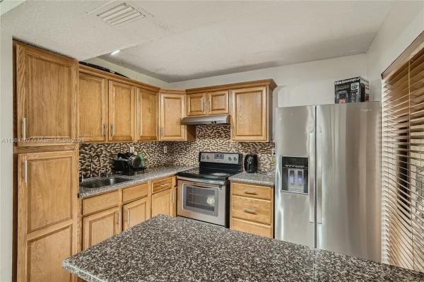 Quatraine, 20015 NE 3rd Ct #5, Ives Estates, Florida 33179, image 1
