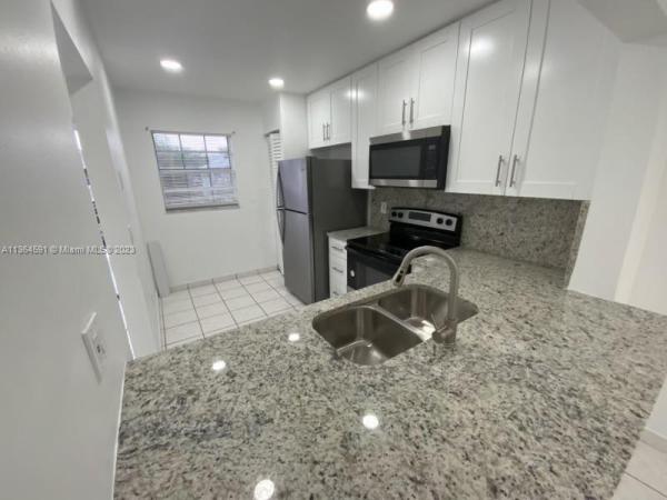 Monterey Village, 426 NE 210th Cir Ter #204-2, Ives Estates, Florida 33179, image 1