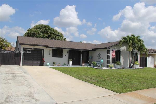 Country Lake Manors, 6417 NW 199th Ter, Country Club, Florida 33015, image 1