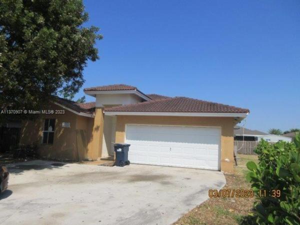 Abel Homes At Cambridge Estates, 13483 SW 278th Ter, Three Lakes, Florida 33032, image 1