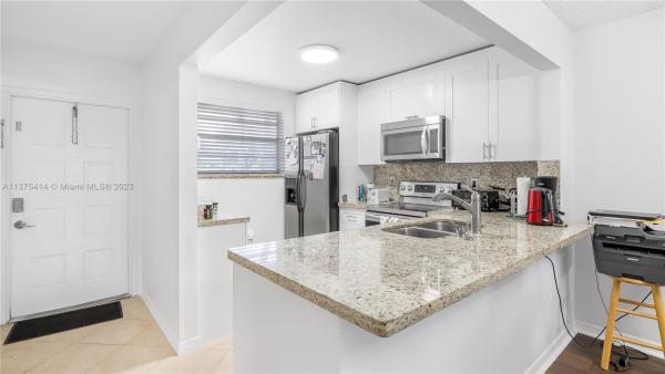 Omega, 7450 NW 17th St #105, Plantation, Florida 33313, image 2