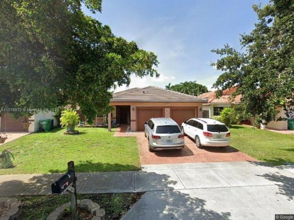 West Lakes Gardens, 8817 NW 149th Ter, Miami Lakes, Florida 33018, image 1