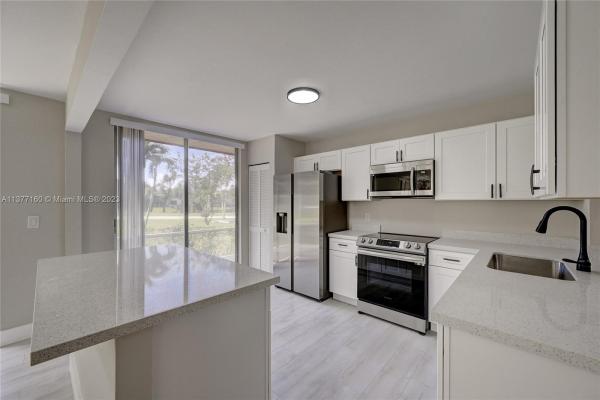 The Atrium At Woodmont, 7582 NW 86th Ter #104, Tamarac, Florida 33321, image 1