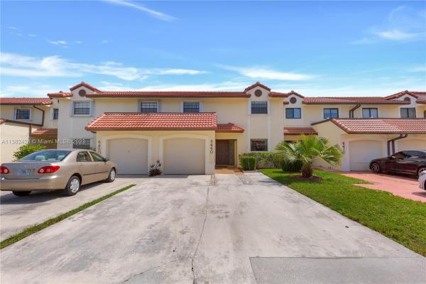 Townhomes Of Country Lake, 6460 NW 192nd Ter, Country Club, Florida 33015, image 1