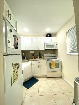 Village Homes & Condos At Palmetto Bay, 17255 SW 95th Ave #E448, Palmetto Bay, Florida 33157, image 1