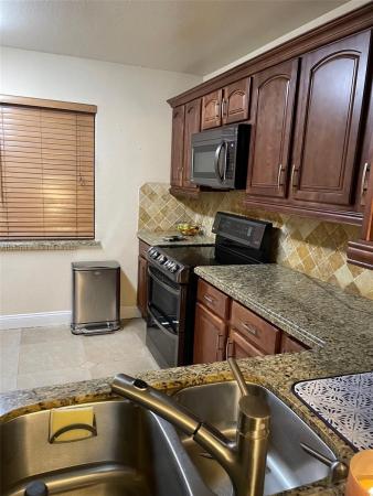 Country Club East Townhouses, 5574 NW 170th St #8, Miami Gardens, Florida 33055, image 1