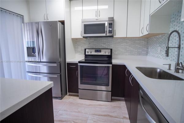 Quatraine, 20205 NE 3rd Ct #4, Ives Estates, Florida 33179, image 1