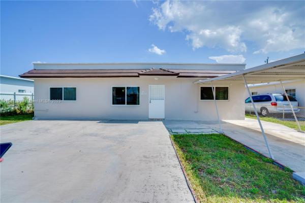 Sun Tan Village, 902 E 14th Pl, Hialeah, Florida 33010, image 1
