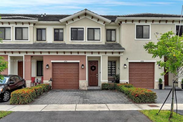 Hidden Lake Townhomes, 12716 SW 131st Ter, Three Lakes, Florida 33186, image 1
