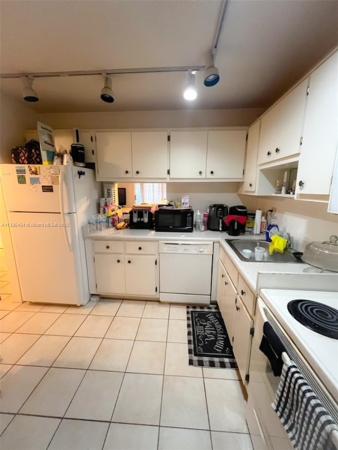 Castle Gardens, 4881 NW 22nd St #A14, Fort Lauderdale, Florida 33313, image 1