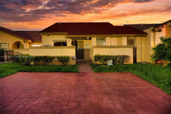 The Moors Townhouses, 6633 NW 179th Ter #6633, Hialeah, Florida 33015, image 1