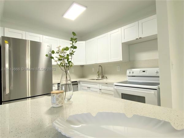 Doral Park Country Club Villas, 4780 NW 102nd Ave #104, Doral, Florida 33178, image 1