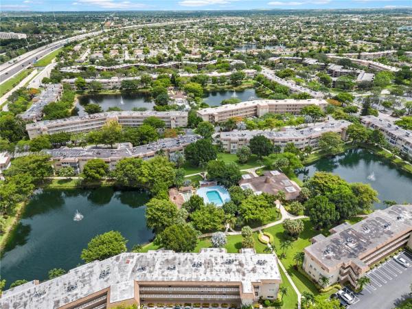 Quinsana Gardens, 5181 W Oakland Park Blvd #114, Lauderdale Lakes, Florida 33313, image 1