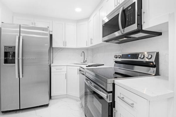 Oakland Grove Village, 649 W Oakland Park Blvd #109A, Oakland Park, Florida 33311, image 1