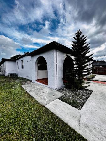 Comfort Gardens, 1041 NW 32nd Pl, Miami, Florida 33125, image 1