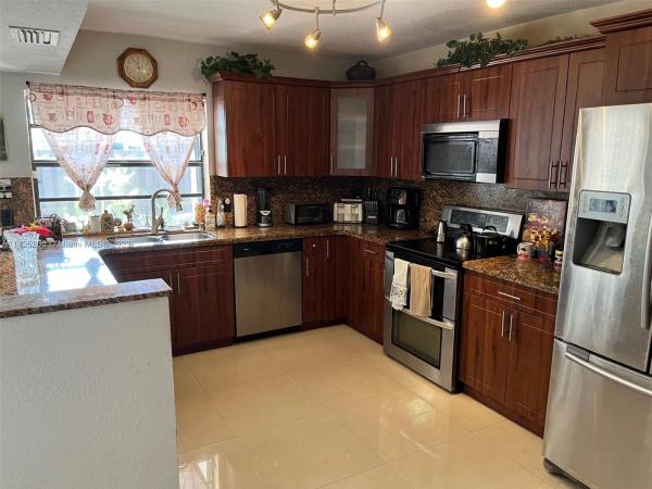 Village Homes In The Crossings, 11033 SW 132nd Ct #14-4, The Crossings, Florida 33186, image 1