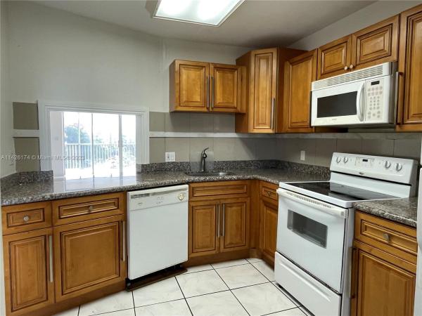 Camellia Gardens, 1770 NE 191st St #602-1, Ojus, Florida 33179, image 1