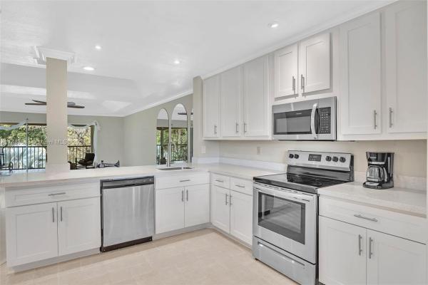 Pinewood At Eastpointe Country Club, 13335 Touchstone Pl #203, West Palm Beach, Florida 33418, image 1