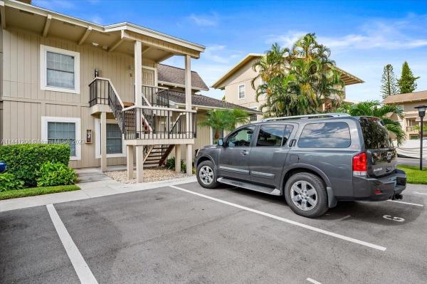 Riverbend Country Club, 18460 SE Wood Haven Ln #H, Jupiter, Florida 33469, image 1